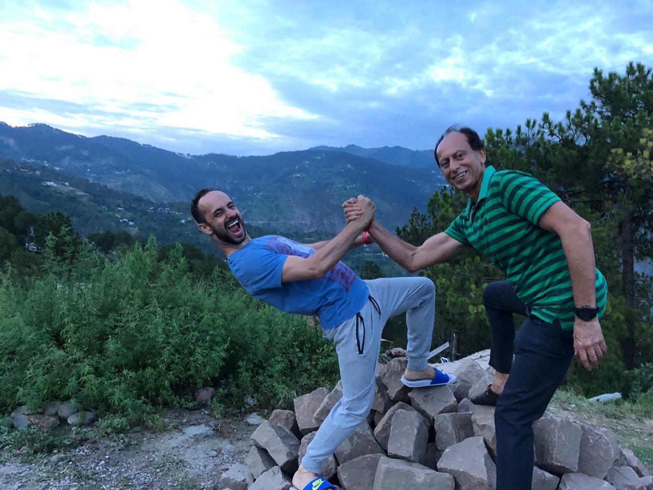 Mrigank and his father on a hillside